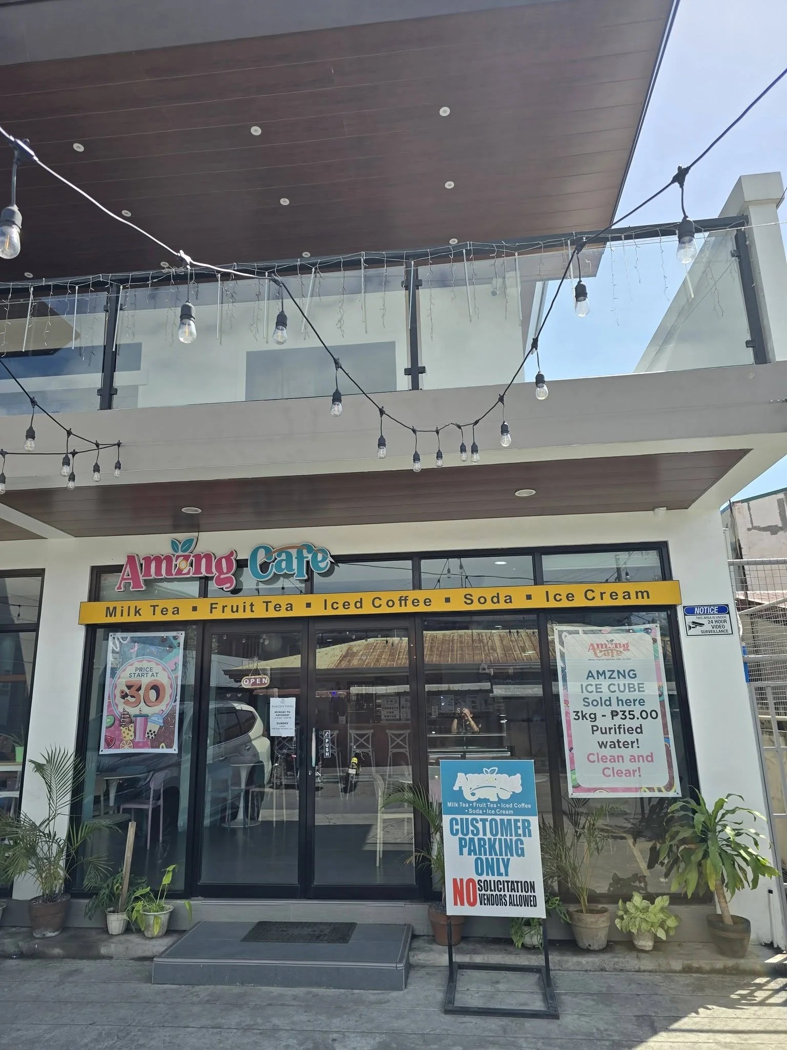 Daytime exterior of Amzng Café