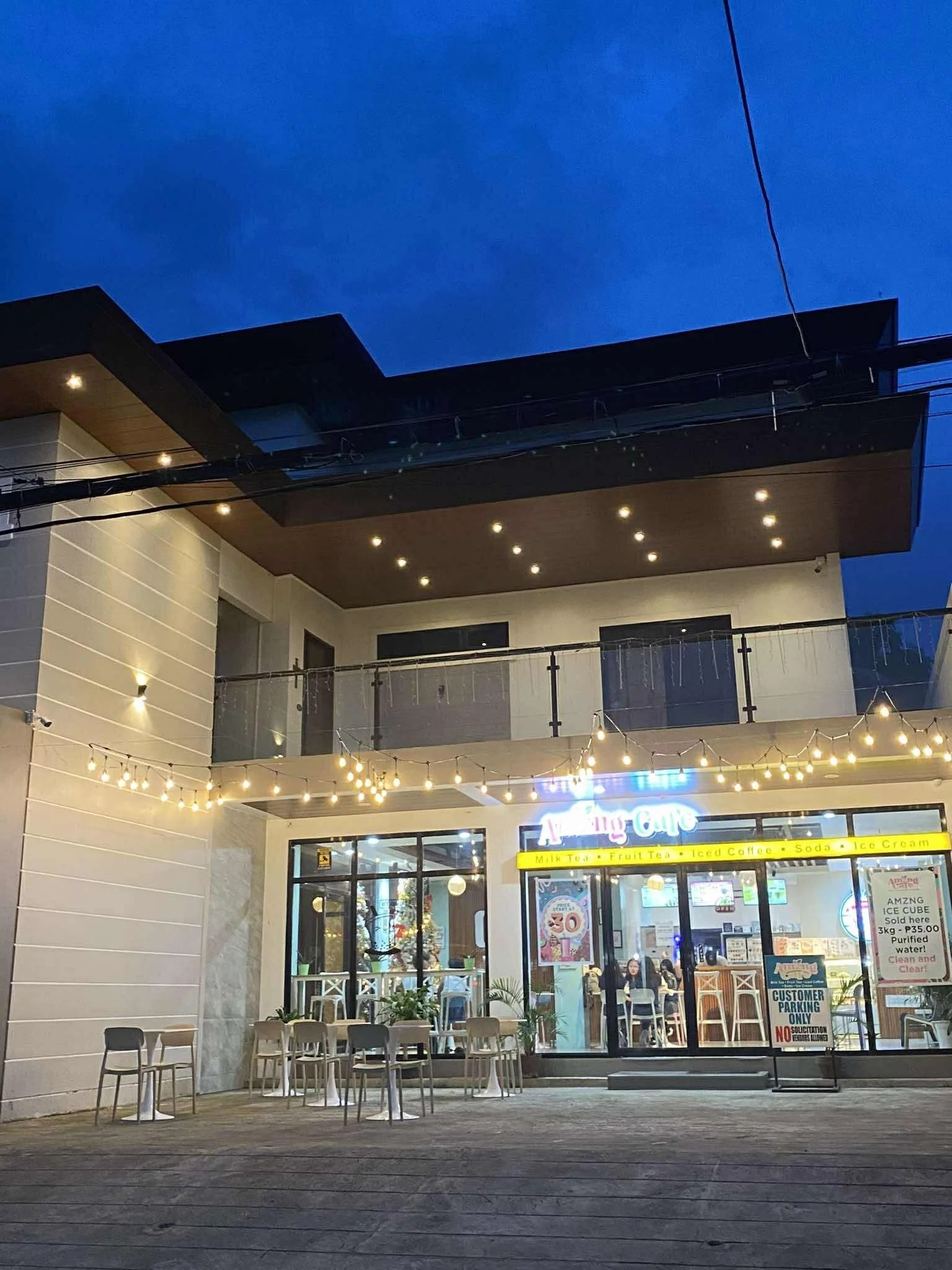 Amzng Café exterior at night